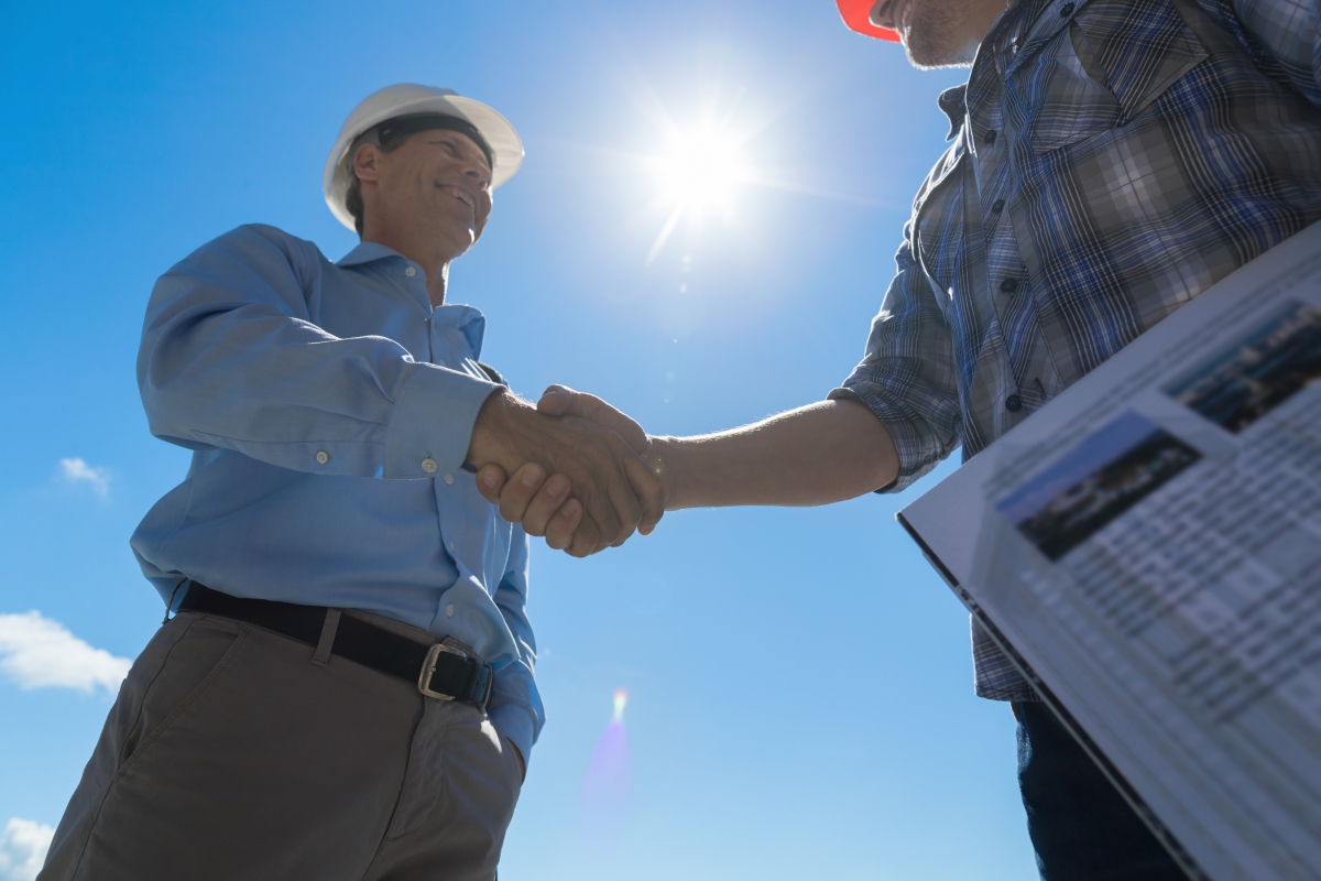 housing contractors shaking hands